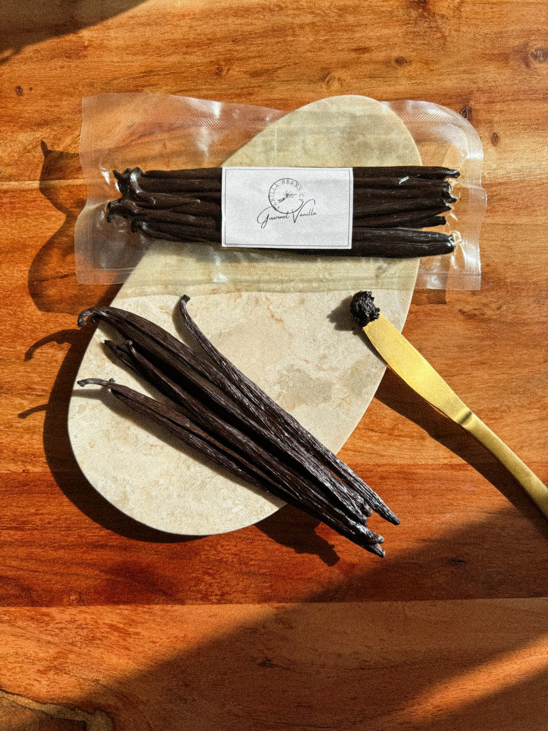 Close-up of premium vanilla beans showcasing their rich texture and natural, aromatic qualities.